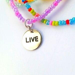 Live Charm Set of Pastel and Confetti Stretch Bracelets Jewelry. 7/09/107